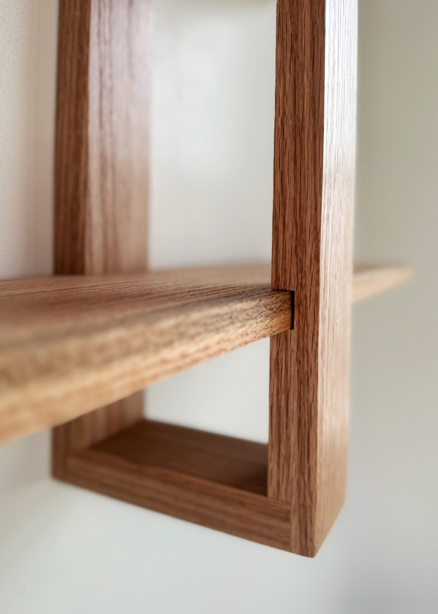 Modern wall-mounted floating shelf – The Odyssey, crafted from real oak for durability and style.